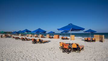 Sun loungers, beach umbrellas