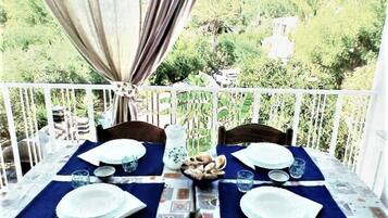 Apartamento, 2 habitaciones, fumadores, patio | Restauración