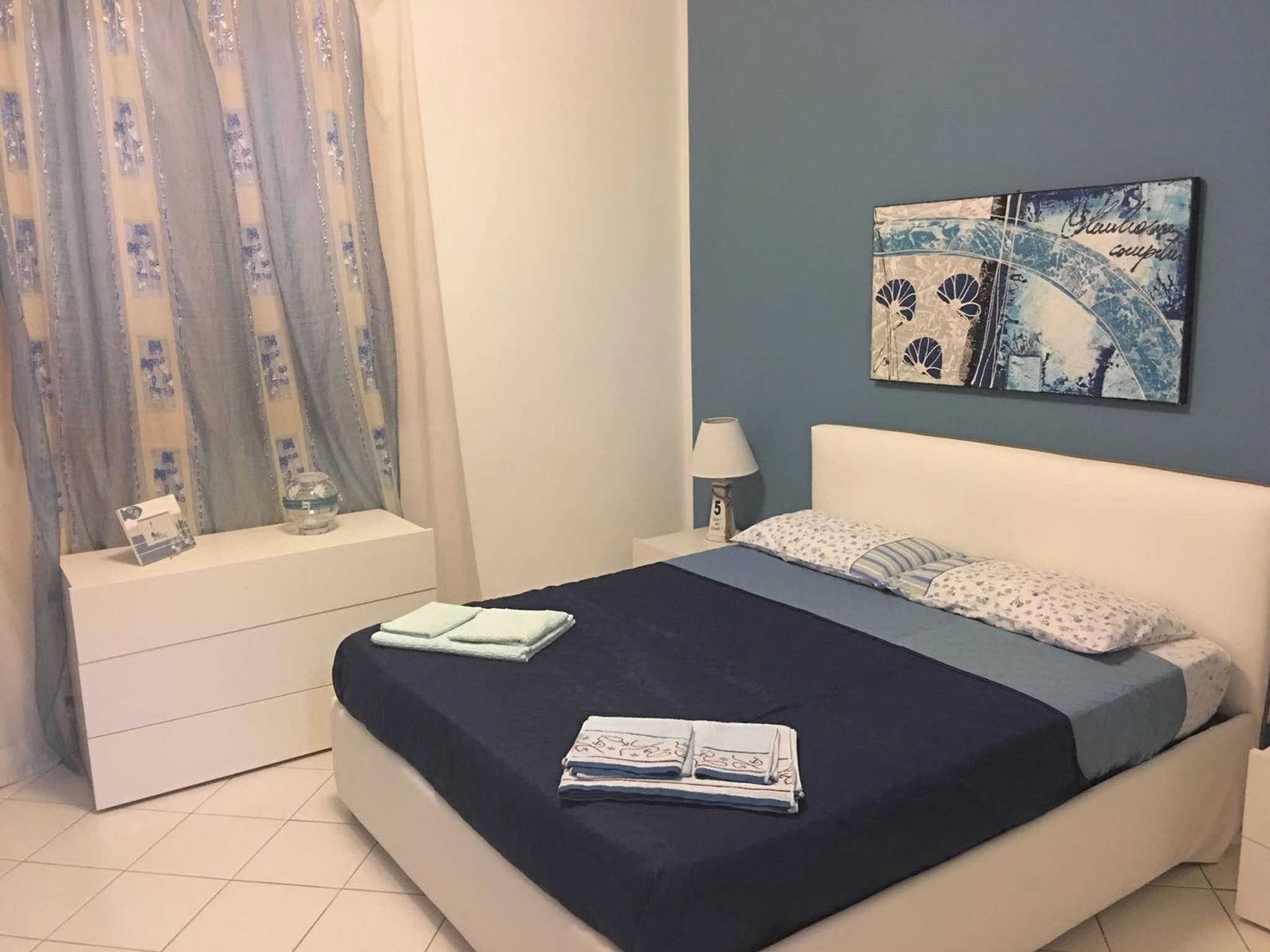 Apartamento, 2 habitaciones, fumadores, piscina privada | 2 dormitorios, tabla de planchar con plancha, ropa de cama