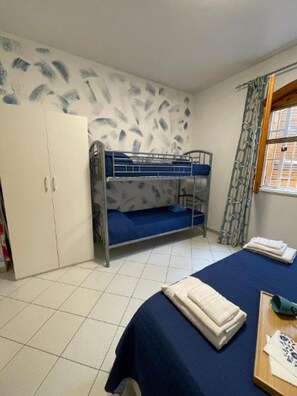 Appartamento, 2 camere da letto, fumatori, piscina privata | 2 camere, ferro/asse da stiro, lenzuola