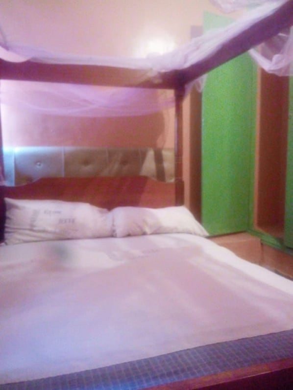Comfort Double Room | Blackout drapes, bed sheets - New Rwathia Guest House (Nairobi)