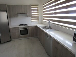 Luxury Villa, 4 Bedrooms | Private kitchen | Fridge, microwave, oven, stovetop