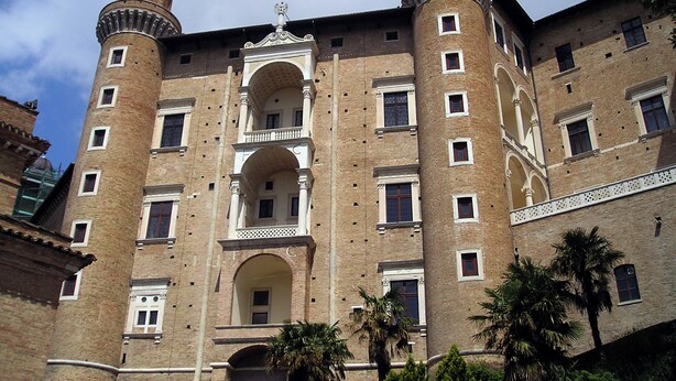 A historic building with a central courtyard, multiple windows, and two prominent towers. - Panoramic Villa Italy Just few Minutes Drive From the Beach (Montelabbate)