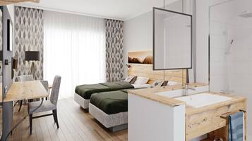 Ein modernes Hotelzimmer mit Holzboden, einem Bett mit grüner Bettwäsche, einem Schreibtisch mit Lampe, einem großen Spiegel und einem Badezimmer mit Dusche.