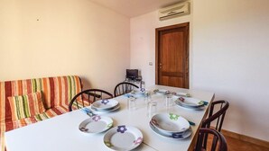 Apartment, 1 Bedroom | Dining - Terrazze sul Mare Alla Ciaccia - Apartment 4 (Valledoria)