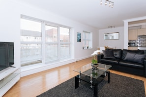 City Apartment, City View (6002. Windmill Lane) | Living area | Flat-screen TV