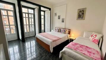 Sublime Brown Bedroom With Balcony | Desk, blackout drapes, iron/ironing board, free WiFi
