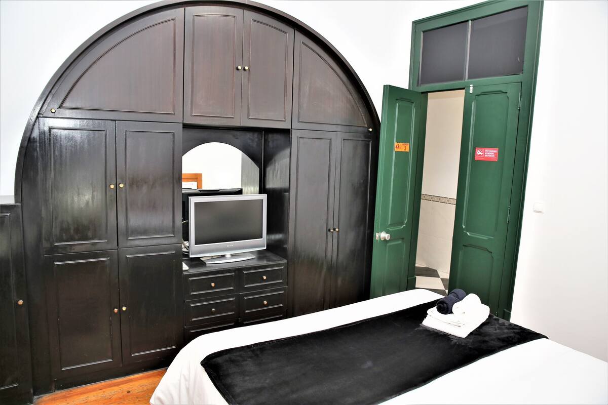 Sublime Black | Desk, blackout drapes, iron/ironing board, free WiFi