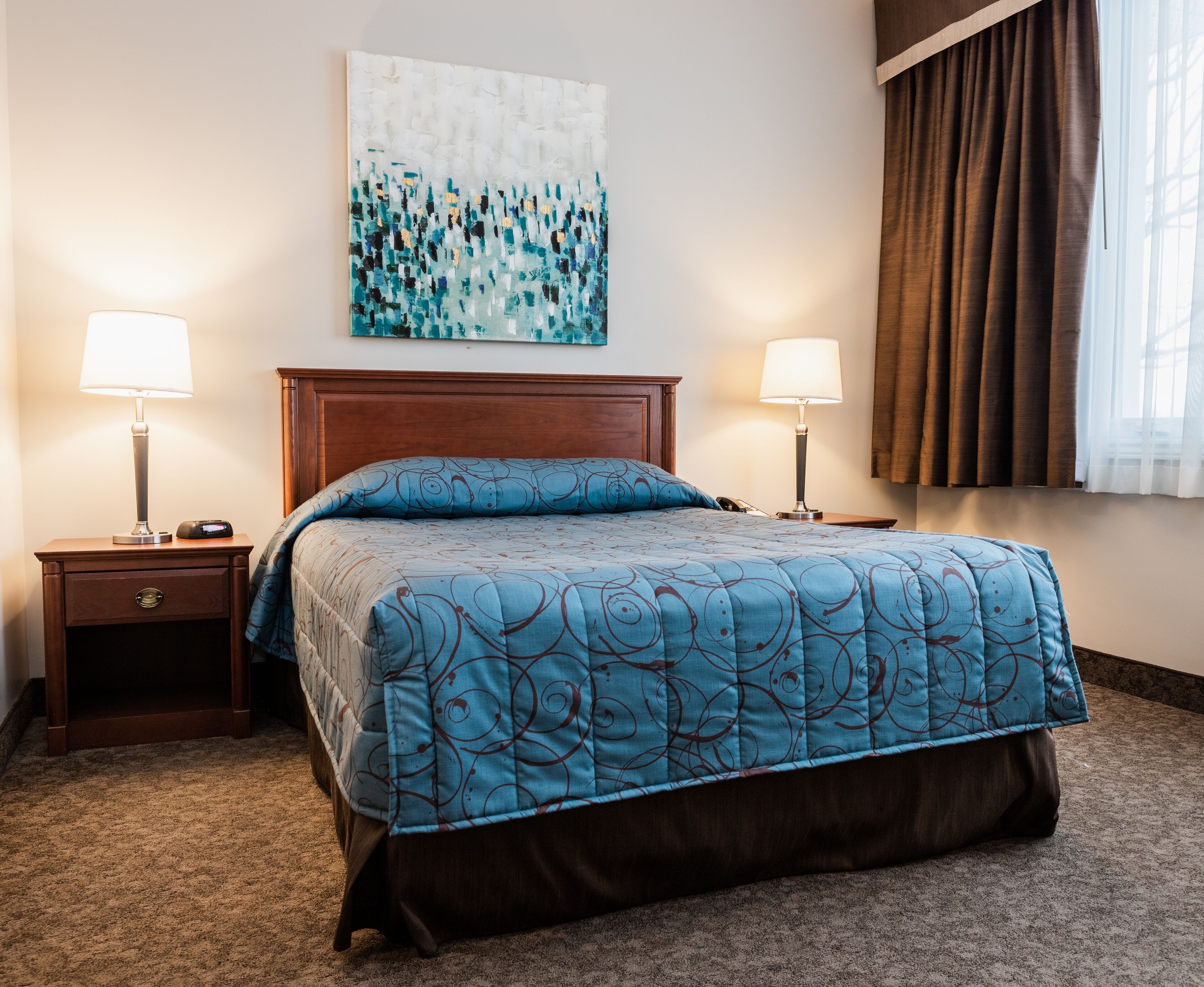 pillow-top beds, laptop workspace, blackout curtains, soundproofing