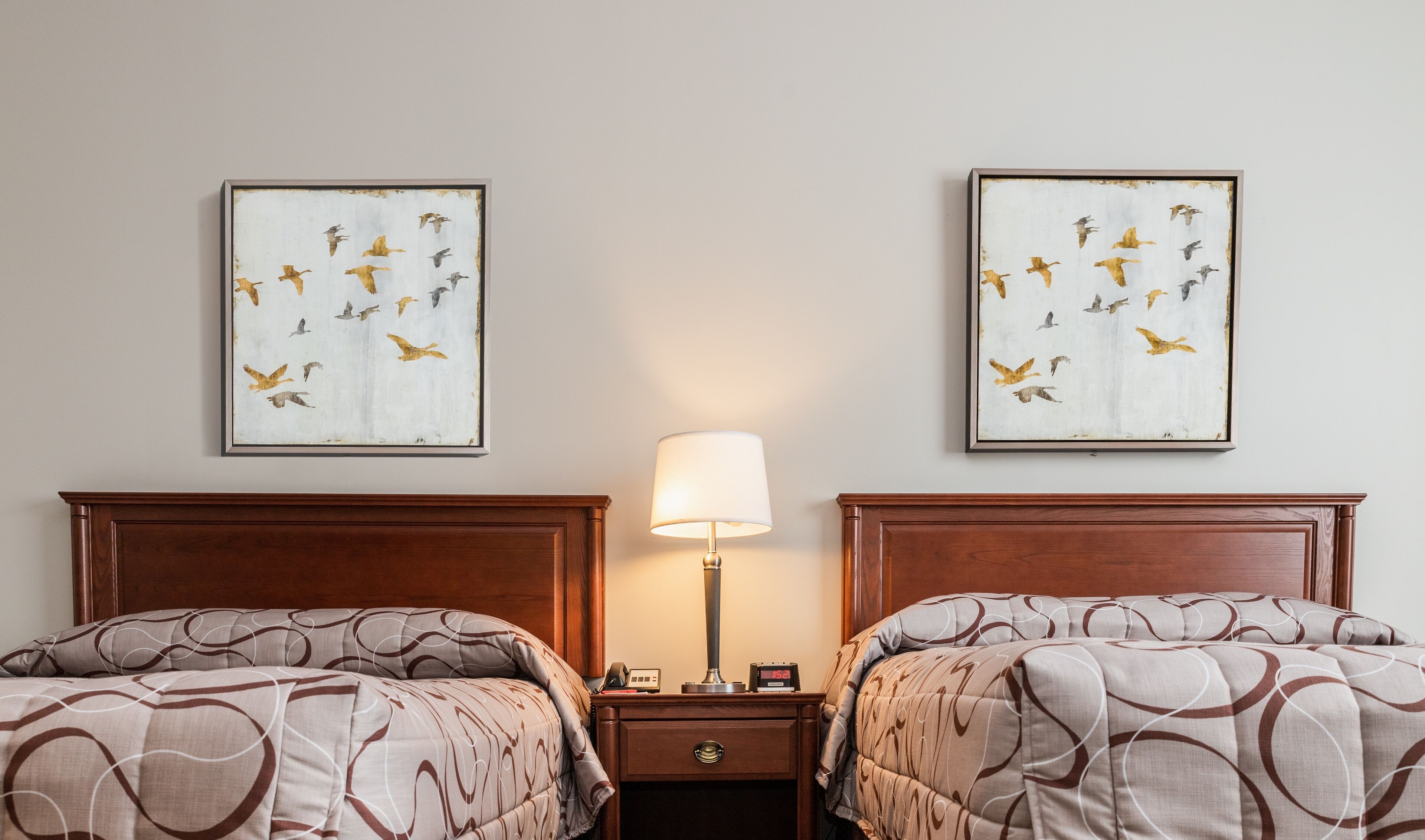 pillow-top beds, laptop workspace, blackout curtains, soundproofing