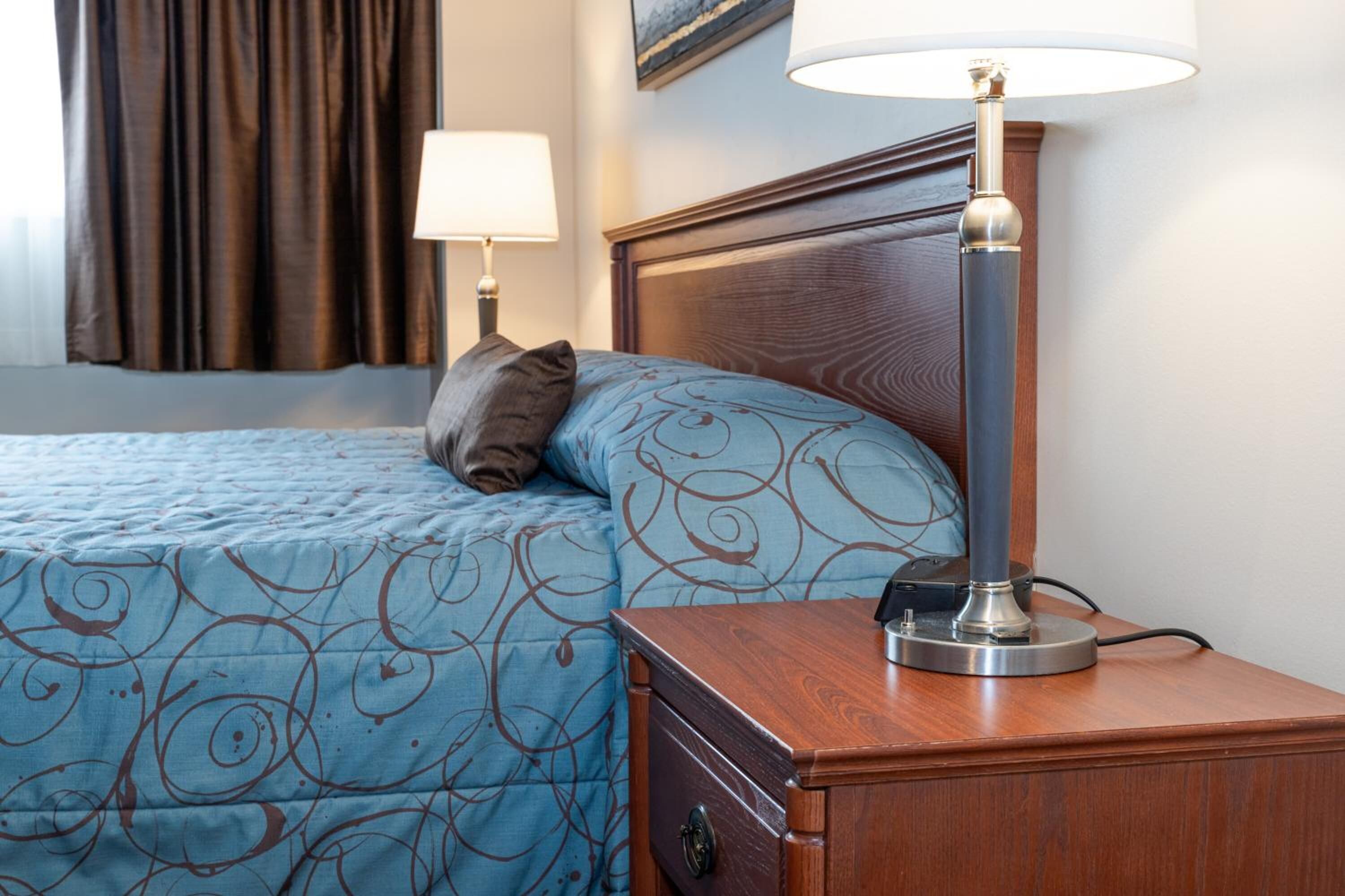 pillow-top beds, laptop workspace, blackout curtains, soundproofing