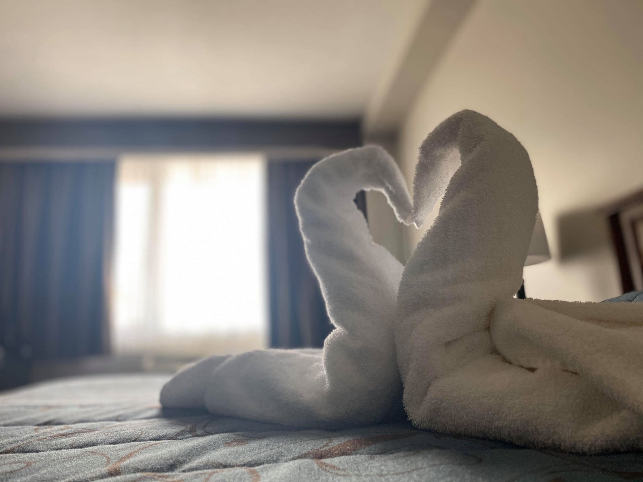 pillow-top beds, laptop workspace, blackout curtains, soundproofing