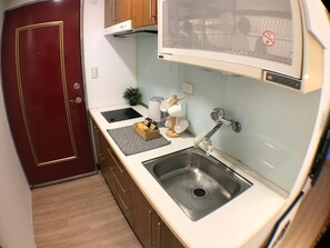 Triple Room, Kitchen (C05) | Private kitchen | Mini-fridge, electric kettle