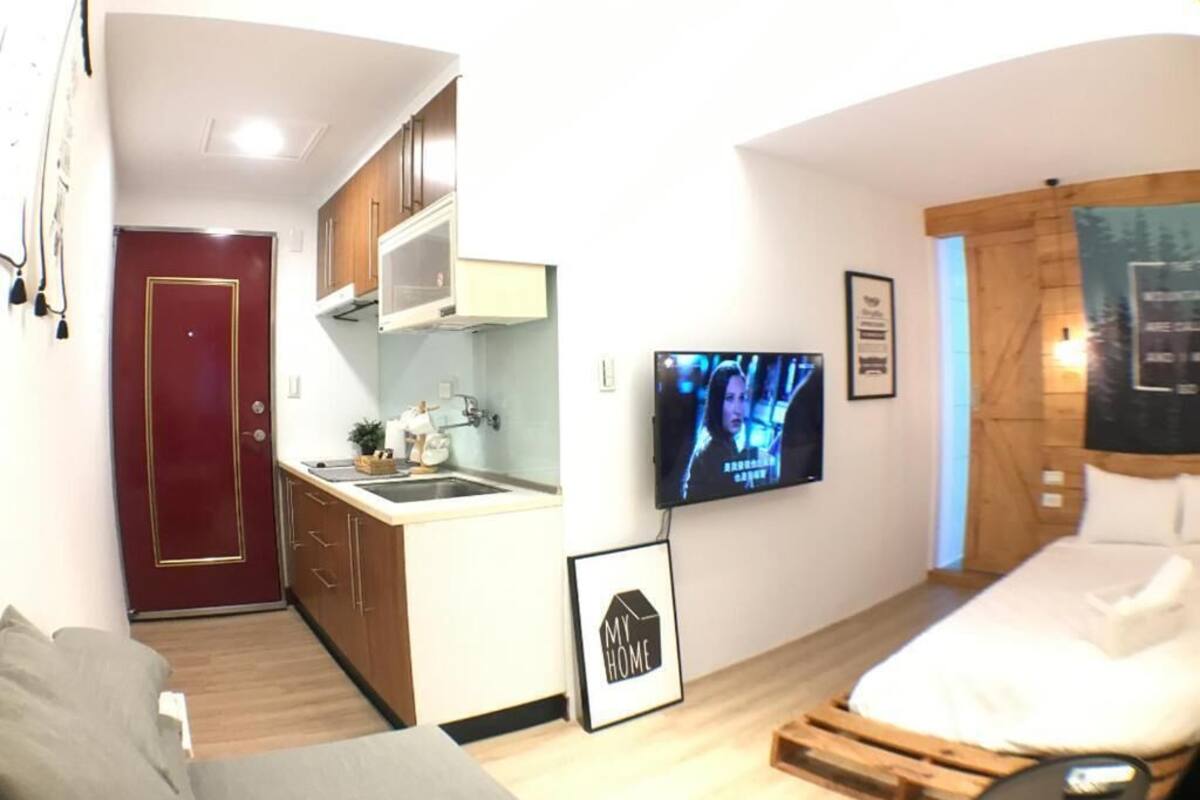 Triple Room, Kitchen (C05) | Blackout curtains, iron/ironing board, free WiFi, bed sheets