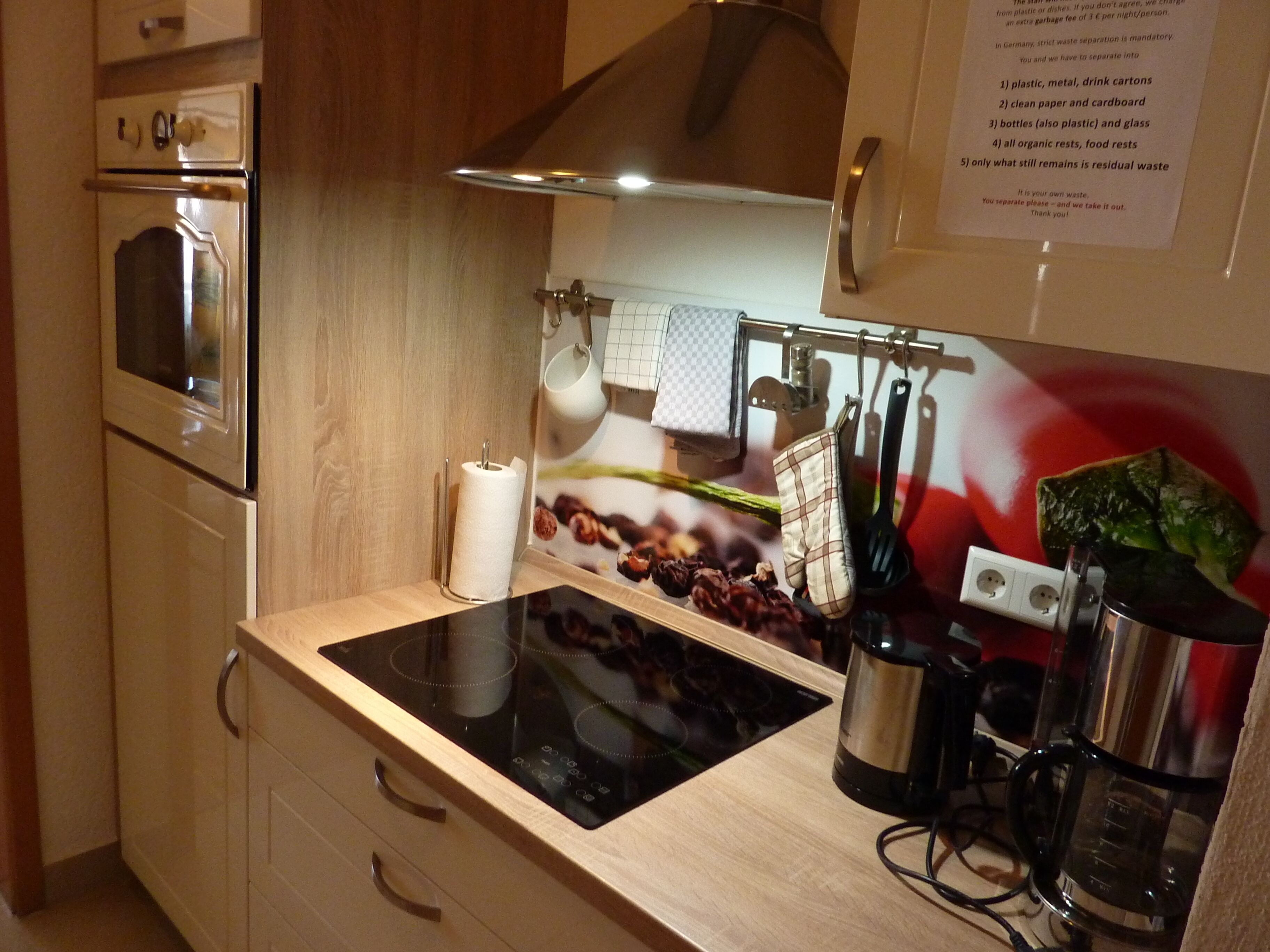 deluxe apartment (4 person) | private kitchen | full-sized fridge, stovetop, dishwasher, espresso maker