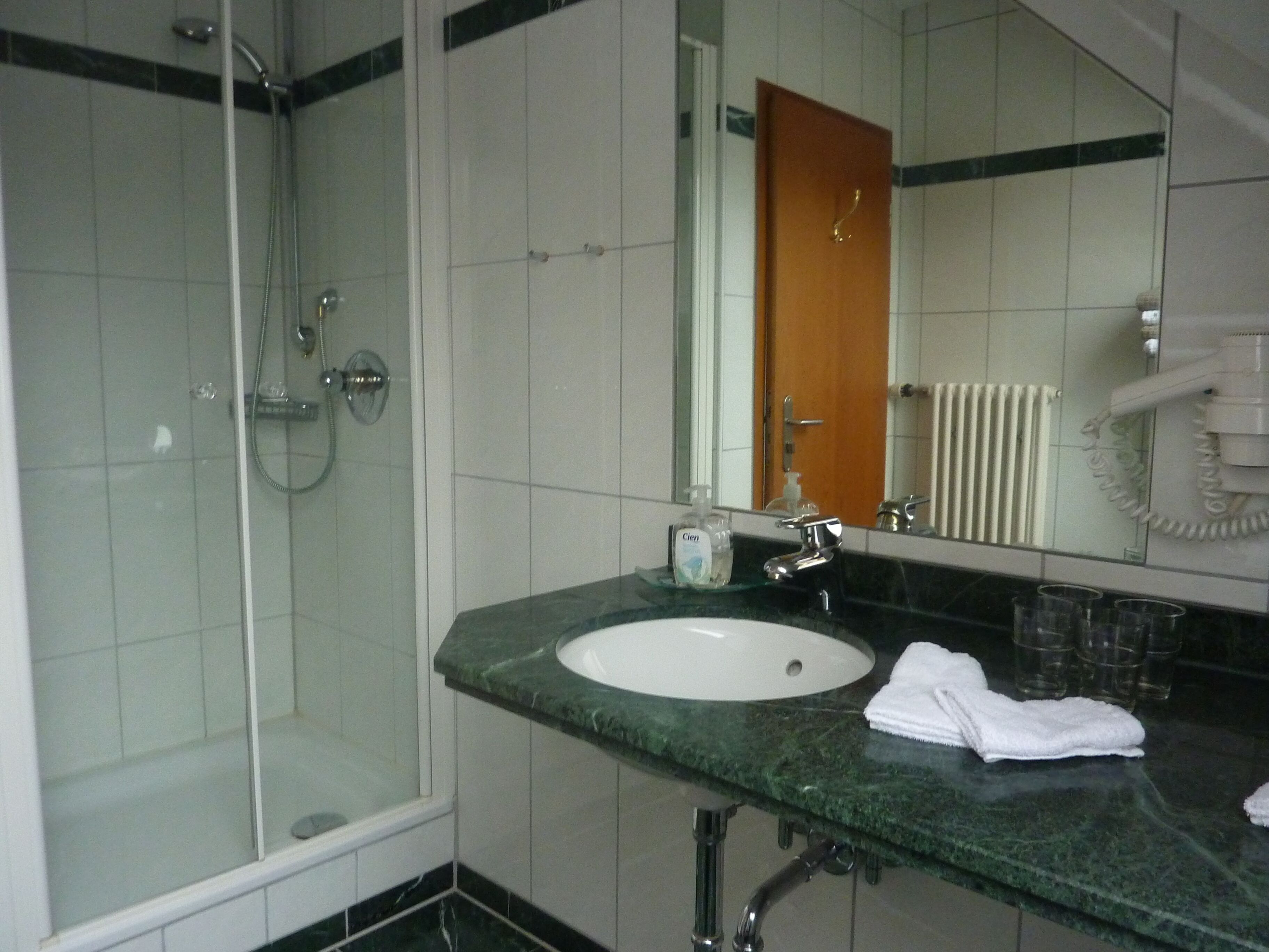 hair dryer, towels, soap, shampoo