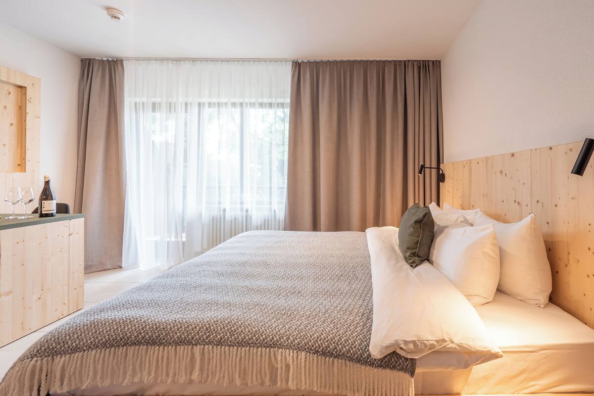 Departamento superior | Ropa de cama hipoalergénica y cortinas blackout