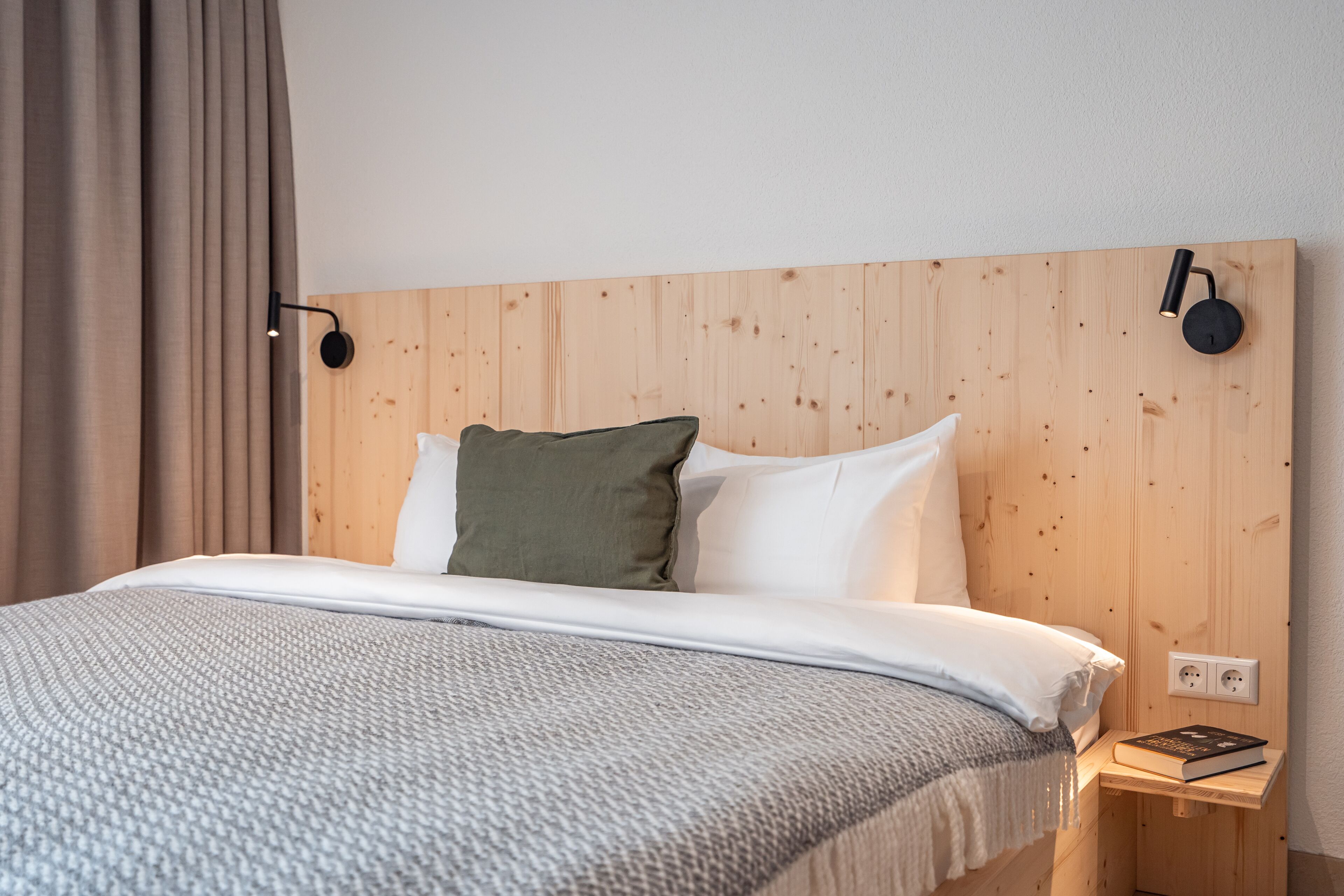 deluxe studio | hypo-allergenic bedding, desk, blackout curtains, iron/ironing board