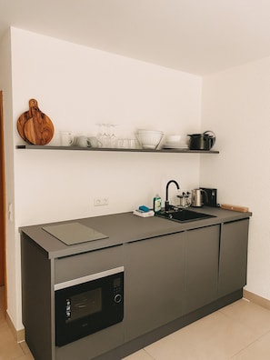 Estúdio luxo | Cozinha privada | Geladeira grande, cooktop, lava-louças, máquina de café expresso