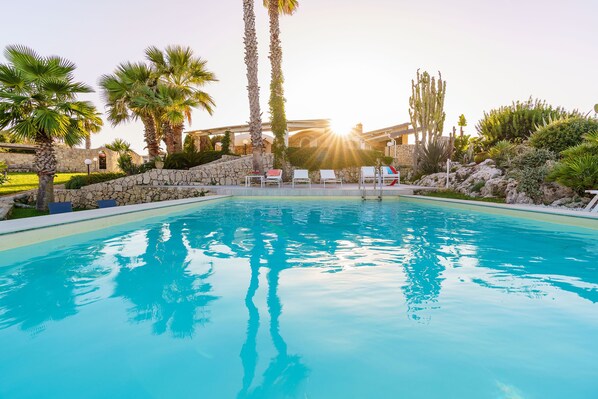 Seasonal outdoor pool, pool umbrellas, sun loungers
