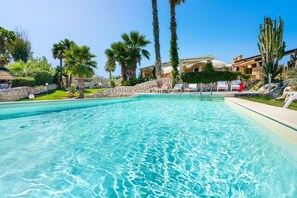 Seasonal outdoor pool, pool umbrellas, sun loungers