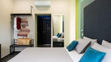 Chambre Deluxe Double ou avec lits jumeaux, vue ville | Draps en coton égyptien, literie de qualité supérieure
