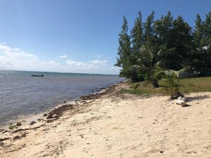 On the beach, sun loungers, beach towels