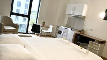 Studio | Individually decorated, individually furnished, desk, laptop workspace