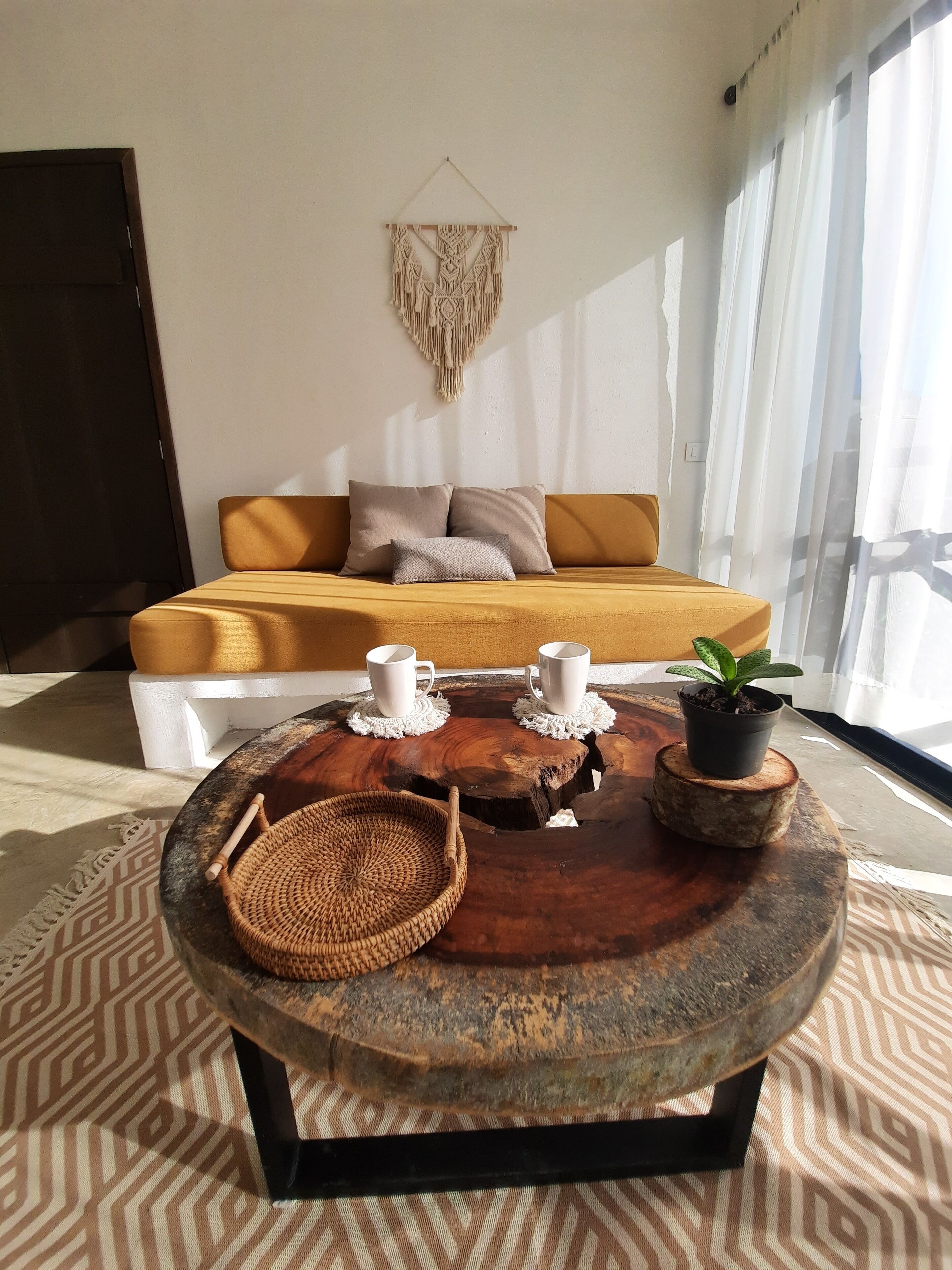 Departamento Deluxe, aire acondicionado, vista al jardín | Sala de estar