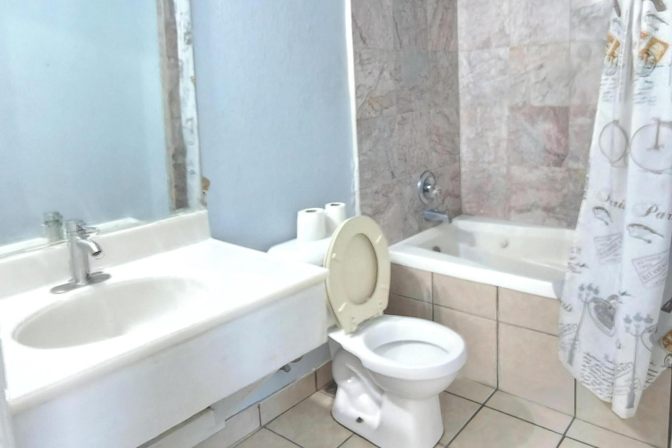 Room, 2 Queen Beds, Non Smoking | Bathroom | Combined shower/tub, free toiletries, hair dryer, towels