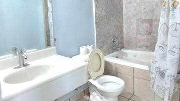 Room, 2 Queen Beds, Non Smoking | Bathroom | Combined shower/tub, free toiletries, hair dryer, towels