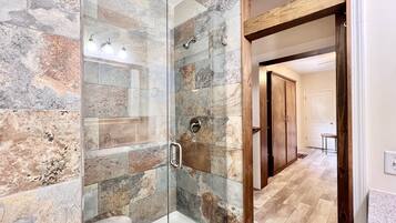 Jetted tub, hair dryer, towels, soap