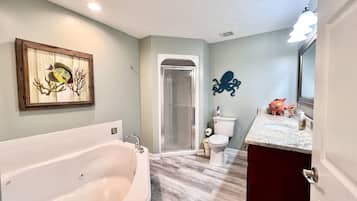 Jetted tub, hair dryer, towels, soap