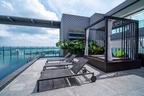Outdoor pool, open 7:00 AM to 8:00 PM, pool loungers