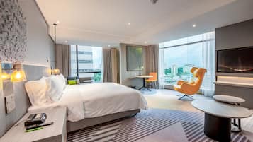 Suite, 1 King Bed, Sea View | Minibar, in-room safe, desk, laptop workspace