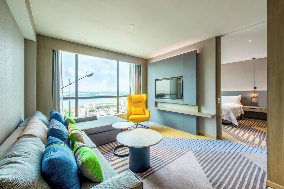 Suite, 1 King Bed with Sofa bed (Top Floor) | Minibar, in-room safe, desk, laptop workspace