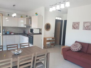Apartment, 2 Bedrooms, Accessible, Patio | Dining - Italian Charm, Modern Elegance in Pizzo (Pizzo)