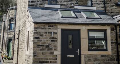 4 Bedrooms, sleeping 6, just 2 minutes walk from Hebden Bridge town square .