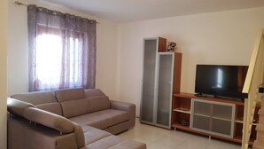 Ferienhaus, 4 Schlafzimmer, Raucher, Balkon | Wohnbereich