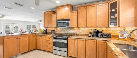 Coffee/tea maker, fridge, microwave, oven