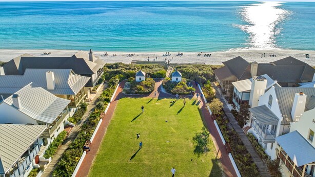 A coastal hotel with a grassy courtyard, beach access, and ocean views. - A Slice Of Paradise! Beautiful Ocean Views And Just Steps From The Beach (Panama City Beach)