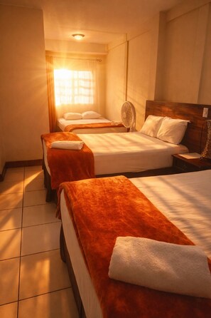 Traditional Quadruple Room, Ensuite | Premium bedding, down comforters, minibar, individually decorated - Hotel Don Felipe (Guatemala City)