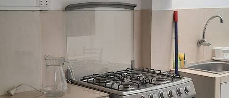 Fridge, microwave, cookware/dishes/utensils