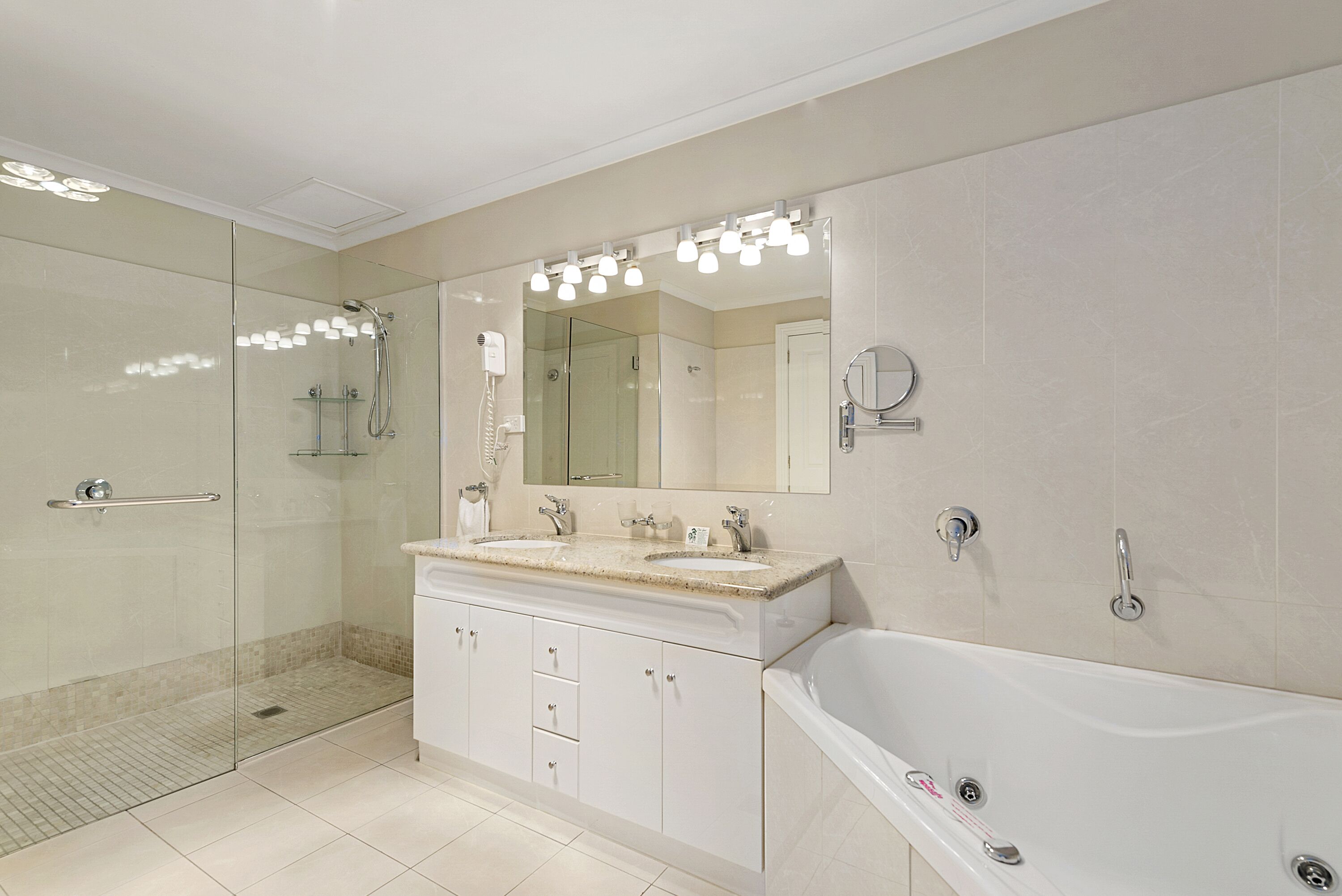 deluxe spa room | bathroom | shower, free toiletries, hair dryer, towels