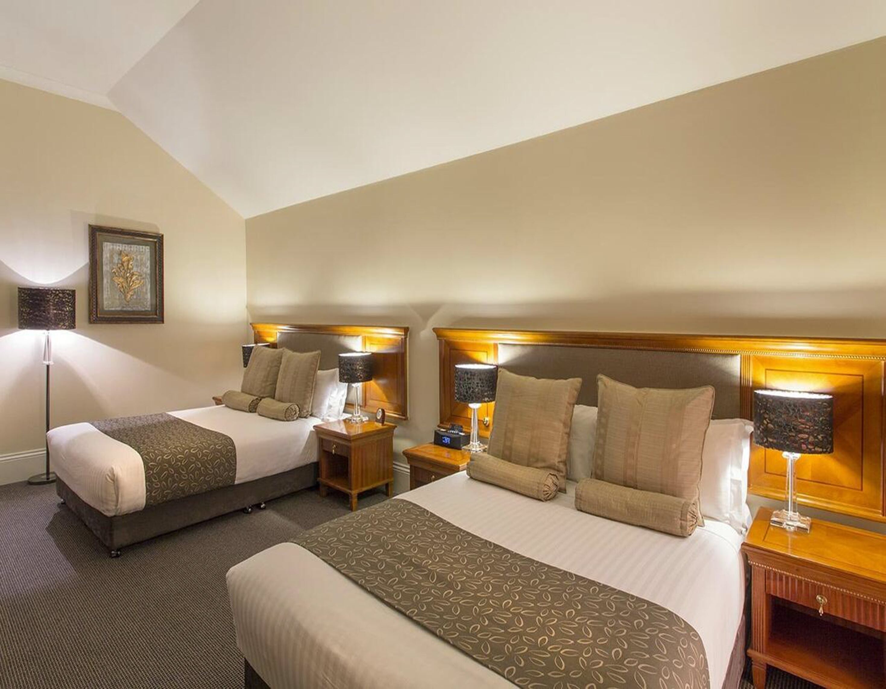 deluxe twin room | in-room safe, desk, laptop workspace, blackout curtains