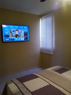 2 habitaciones, tabla de planchar con plancha y wifi gratis 