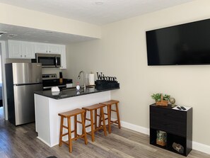 Microwave, coffee/tea maker, cookware/dishes/utensils