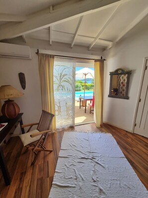 Room, Pool View, Beachfront | 1 bedroom, minibar, in-room safe, desk - Villa Tonga Soa (Nosy Be)
