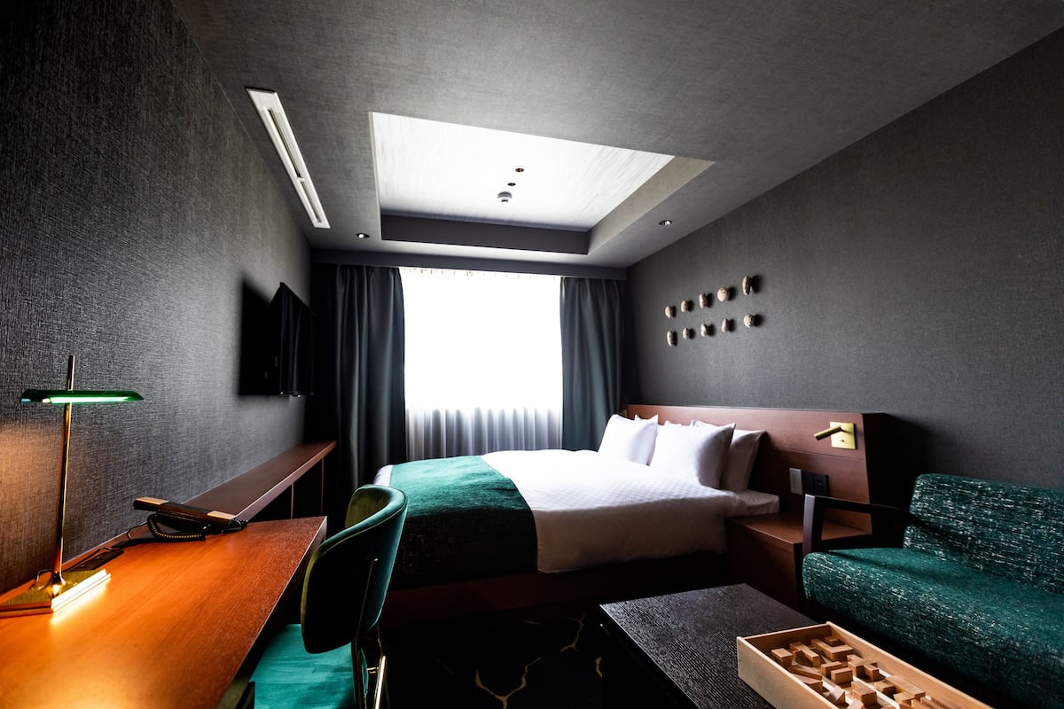 Queen Room | 1 bedroom, down duvets, in-room safe, individually decorated