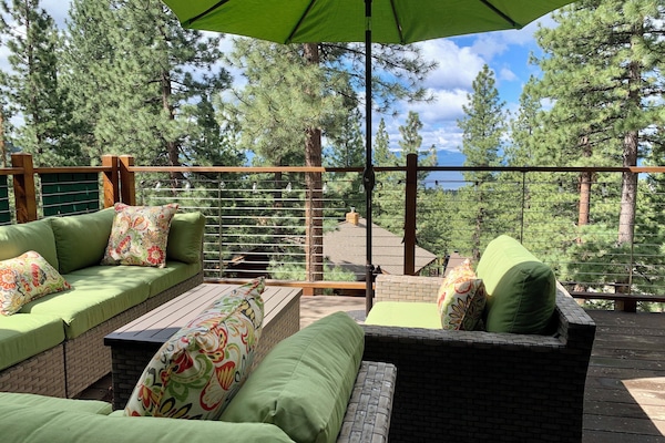 Relax on the upper level deck...amazing views of Sierra forest and lake beyond!